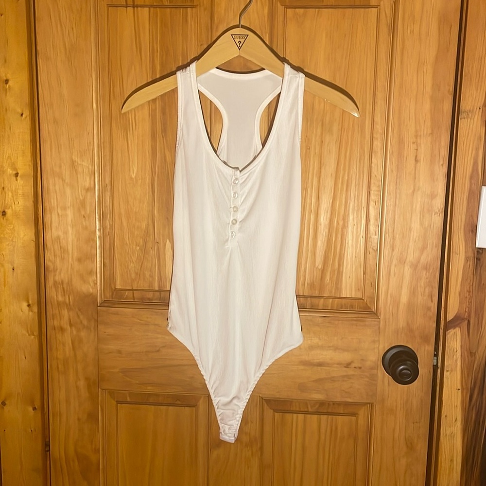 White Ribbed Sleeveless Racerback Button Front Bodysuit